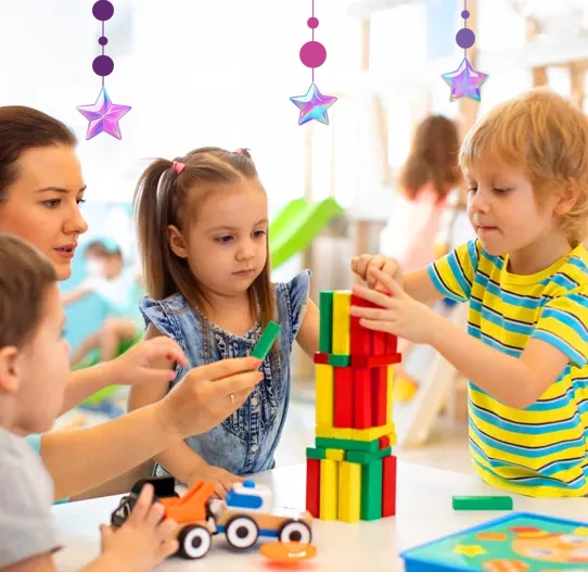Happy child playing with colorful toys in daycare
